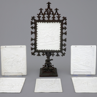 A gothic revival cast iron candle holder with six lithophane plaques, 19/20th C.