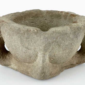 A large stone mortar, 13/14th C.