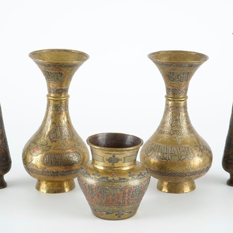 Two pairs of Cairoware brass vases and a smaller one, Egypte, 19th C.