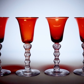 A set of 4 airtwist glasses with orange cup, 19th C.