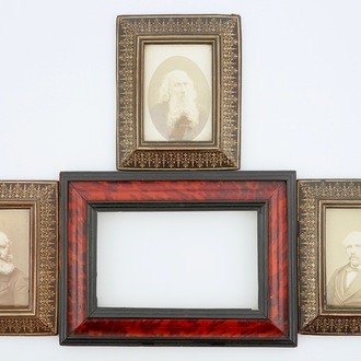 A set of three parcel-gilt leather frames and a tortoise veneer frame, 19th C.