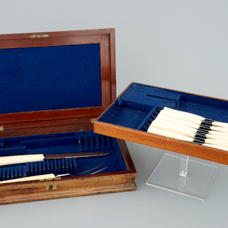 12 knives, a meat fork and knife with ivory handles, ca.1930, Congo, in box