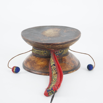 A Tibetan human skull drum, damaru, in original case, Tibet, 18/19th C.