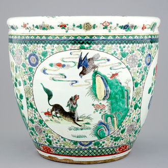 A large Chinese famille verte fish bowl with mythological animals, 19th C.
