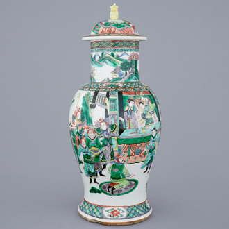 A Chinese famille verte vase and cover with a court scene, 19th C.