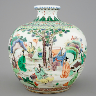 A fine Chinese famille verte vase with scholars in a garden, 19th C.