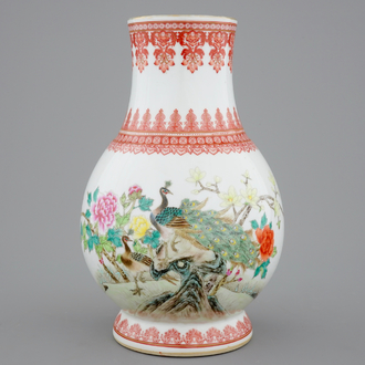 A Chinese Republic famille rose vase with a peacock, 20th C.