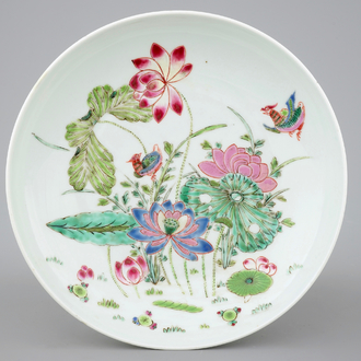 A Chinese famille rose "Lotus pond" plate, 19th C.