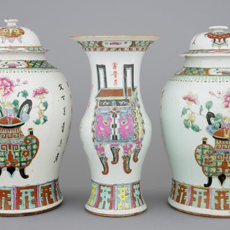 A set of three Chinese famille rose vases, 19th C.