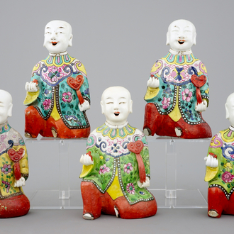 A set of 5 Chinese famille rose figures of laughing boys, 19th C.