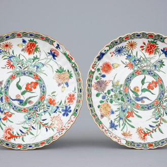 A pair of notched Chinese famille verte dishes with floral designs, Kangxi