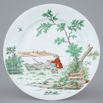 A large Dutch-decorated Chinese dish with a fisherman, 18th C.