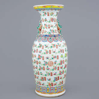 A tall Chinese famille rose vase with luck symbols and fruits, 19th C.