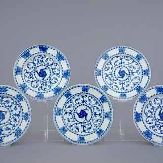 A set of five Chinese blue and white plates with carps, Kangxi