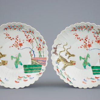 A pair of Chinese famille verte Kakiemon style plates, Kangxi, 1st quarter 18th C.