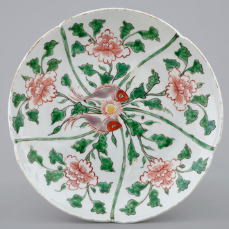 A Chinese wucai plate with twin fish design, Wanli, 1573-1619