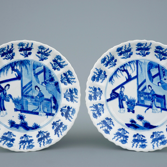 A pair of Chinese blue and white moulded plates with long Eliza, Kangxi