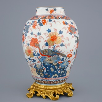A large Chinese Imari-style export porcelain vase on gilt bronze foot, 18th C.