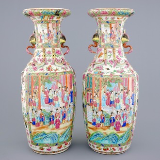 An excellent pair of Chinese Canton famille rose vases with duck handles, 19th C.