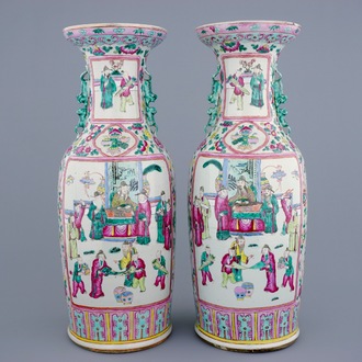 A tall pair of Chinese famille rose vases with court scenes, 19th C.