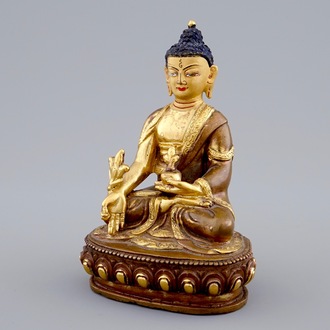 A Sino-Tibetan gilt bronze figure of a seated Buddha, 19/20th C.