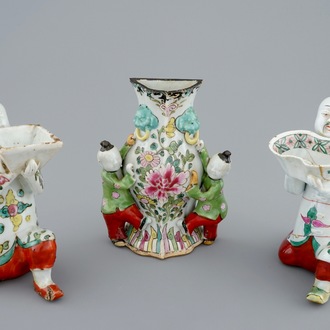Two Chinese famille rose figures and a wall vase, 18/19th C.