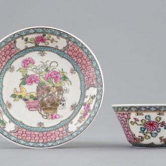 A Chinese famille rose eggshell cup and saucer with a cat near a flowervase, Yongzheng, 1723-1735