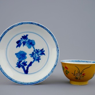 A Chinese famille verte café au lait ground cup and saucer, Kangxi