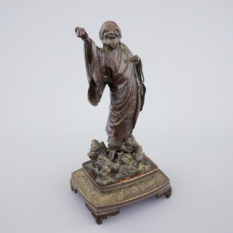 A fine Japanese bronze figure of a sage on base, Meiji, 19th C.