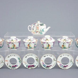 A Chinese qianjiang cai teapot and six matching covered cups on stands, 19/20th C.