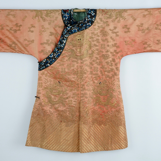 A Chinese orange ground silk embroidered dragon robe, 19th C.