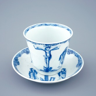 A blue and white Chinese cup and saucer with "The crucifixion", Kangxi