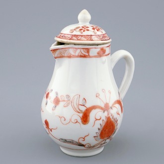 A Chinese iron red and grisaille milk jug and cover, Qianlong, 18th C.