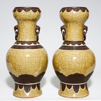 A pair of Chinese crackle glazed café au lait ground Nanking vases, 19th C.