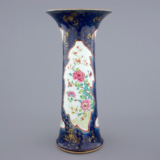 A tall Chinese famille rose powder blue ground vases, Qianlong, 18th C.