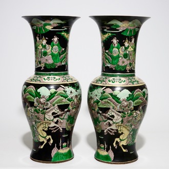 A pair of Chinese famille noire yenyen vases with warrior scenes, 19th C.