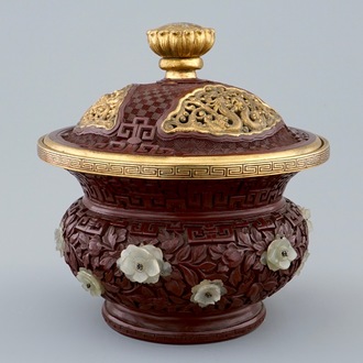 An unusual round Chinese lacquer box and cover with jade inset, 19/20th C.