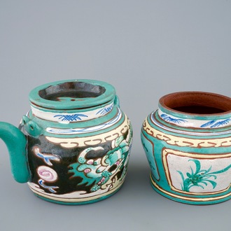 A Chinese enamelled Yixing teapot and cover with a small storage jar, 19th C.