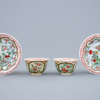 A pair of Chinese famille verte cups and saucers, Kangxi