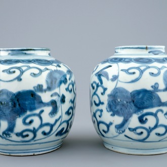 A pair of Chinese blue and white vases with buddhist lions, Ming, Wanli, 1573-1619