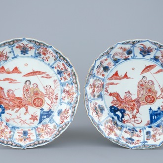 A pair of Chinese Imari style plates with a horse carriage, Kangxi/Yongzheng
