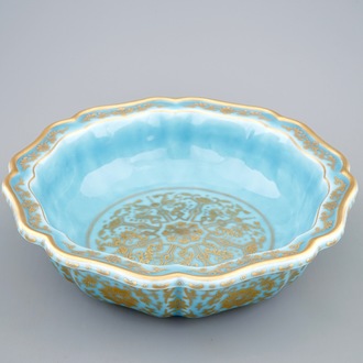 A Chinese lavender blue and gilt octafoil lobed bowl in box, Qianlong mark, 20th C.