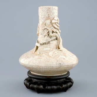 A Chinese crackle glaze vase with an applied landscape, Nanking, 19th C.