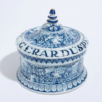 A Dutch Delft blue and white tobacco box and cover with tamper, dated 1763