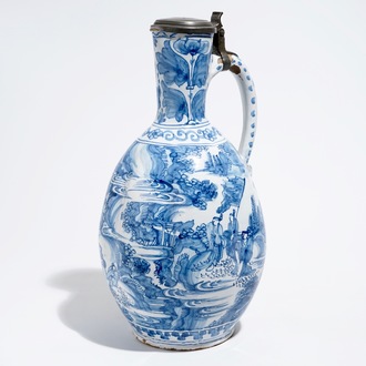 A huge blue and white Dutch Delft chinoiserie jug with an Antwerp pewter lid, 17th C.