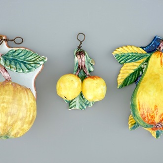 A set of three pieces of polychrome Dutch Delft models of fruit, 19th C.