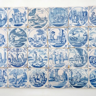 A set of 24 Dutch Delft blue and white biblical tiles, 18th C.