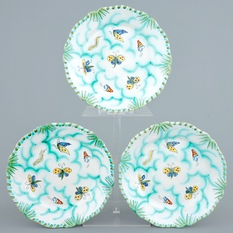 Three Brussels faience plates with butterflies and caterpillars, 18/19th C.