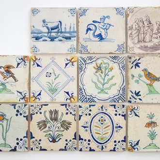 Eleven Dutch Delft tiles executed in blue & white, manganese and polychrome enamels, 17/18th C.
