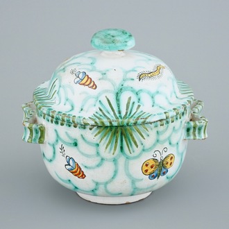 A Brussels faience tureen and cover with butterflies and caterpillars, 18/19th C.